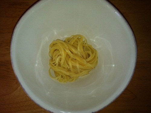 The key to non-soggy noodles is to put them in the bowl just before ladling on the broth.